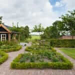 grote tuin terrasoverkapping tuinaanleg hovenier Nederveen Tuinen