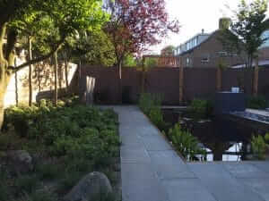 Tuinaanleg beton tegels hovenier tuinontwerp Amsterdam